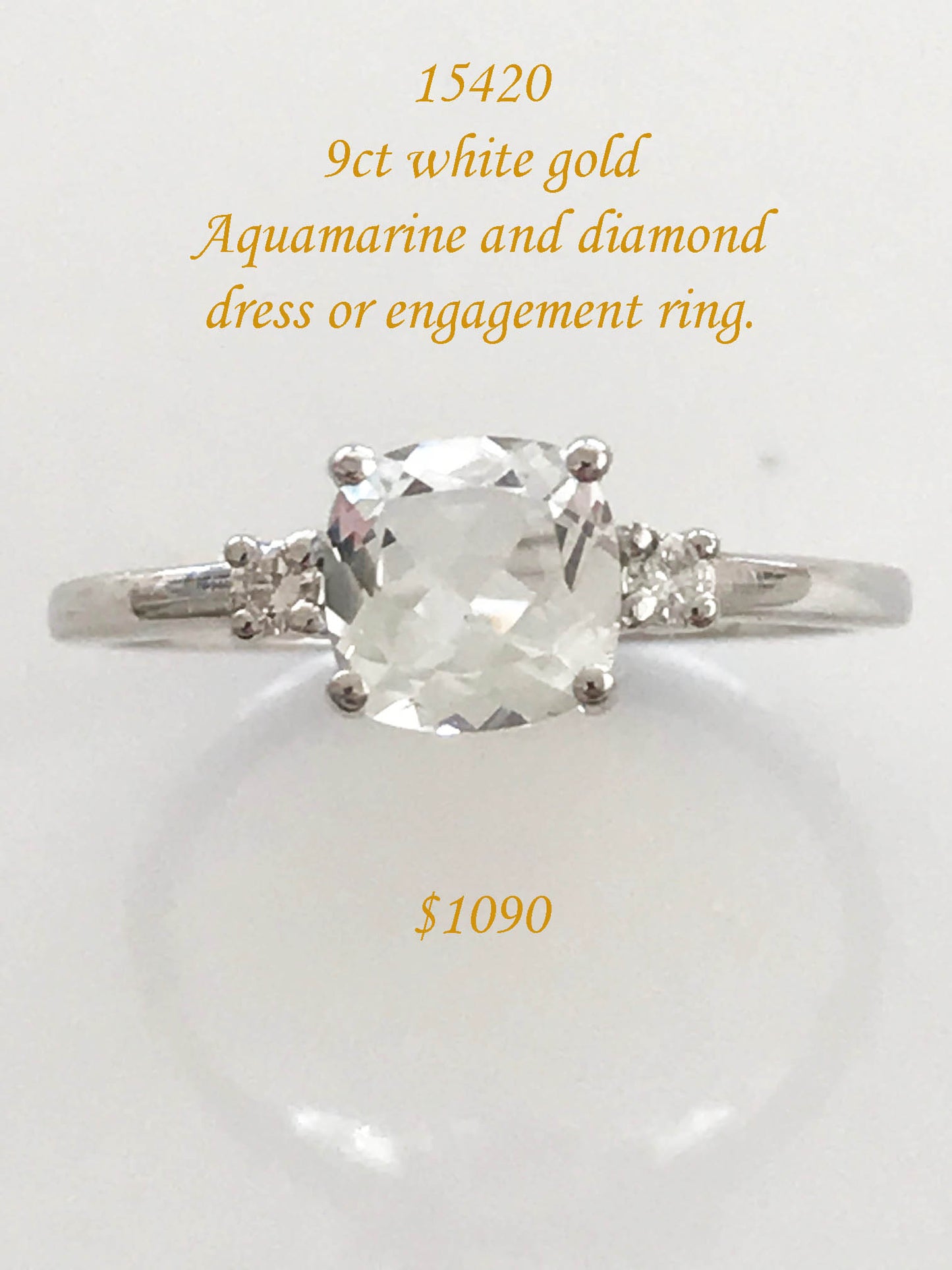 Aquamarine and diamond ring in 9ct white gold.