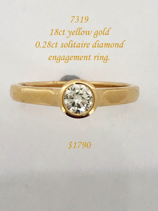 Solitaire diamond ring in 18ct yellow gold.